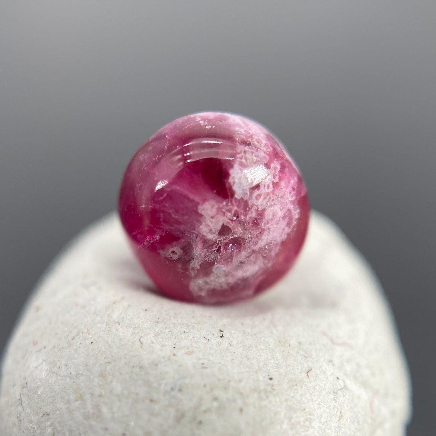 1.25 ct. Ultra-Rare Red Beryl on Rhyolite Matrix Cabochon