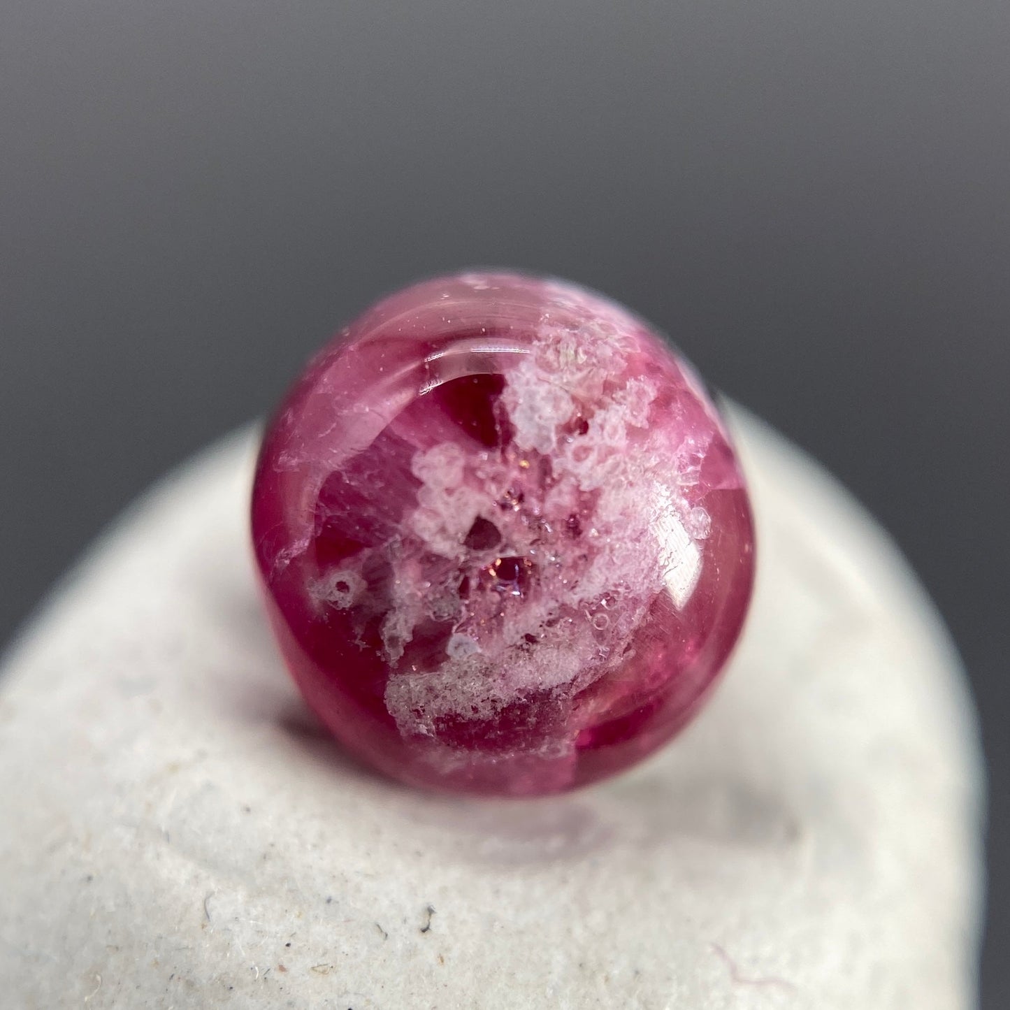 1.25 ct. Ultra-Rare Red Beryl on Rhyolite Matrix Cabochon