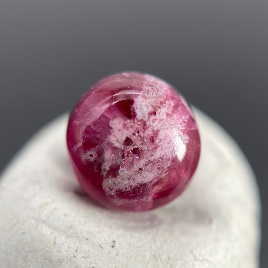 1.25 ct. Ultra-Rare Red Beryl on Rhyolite Matrix Cabochon