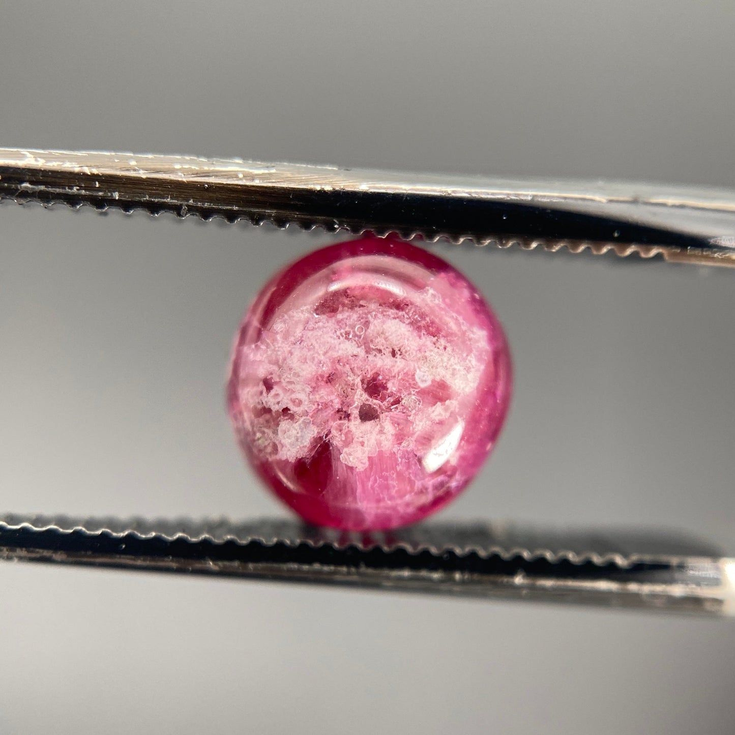 1.25 ct. Ultra-Rare Red Beryl on Rhyolite Matrix Cabochon