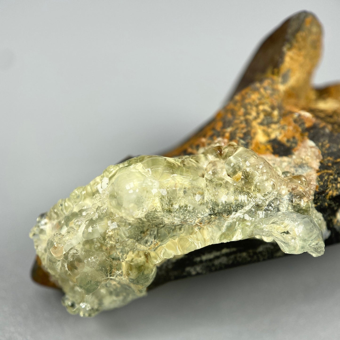 19.98 g. Hyalite Opal on Smoky Quartz