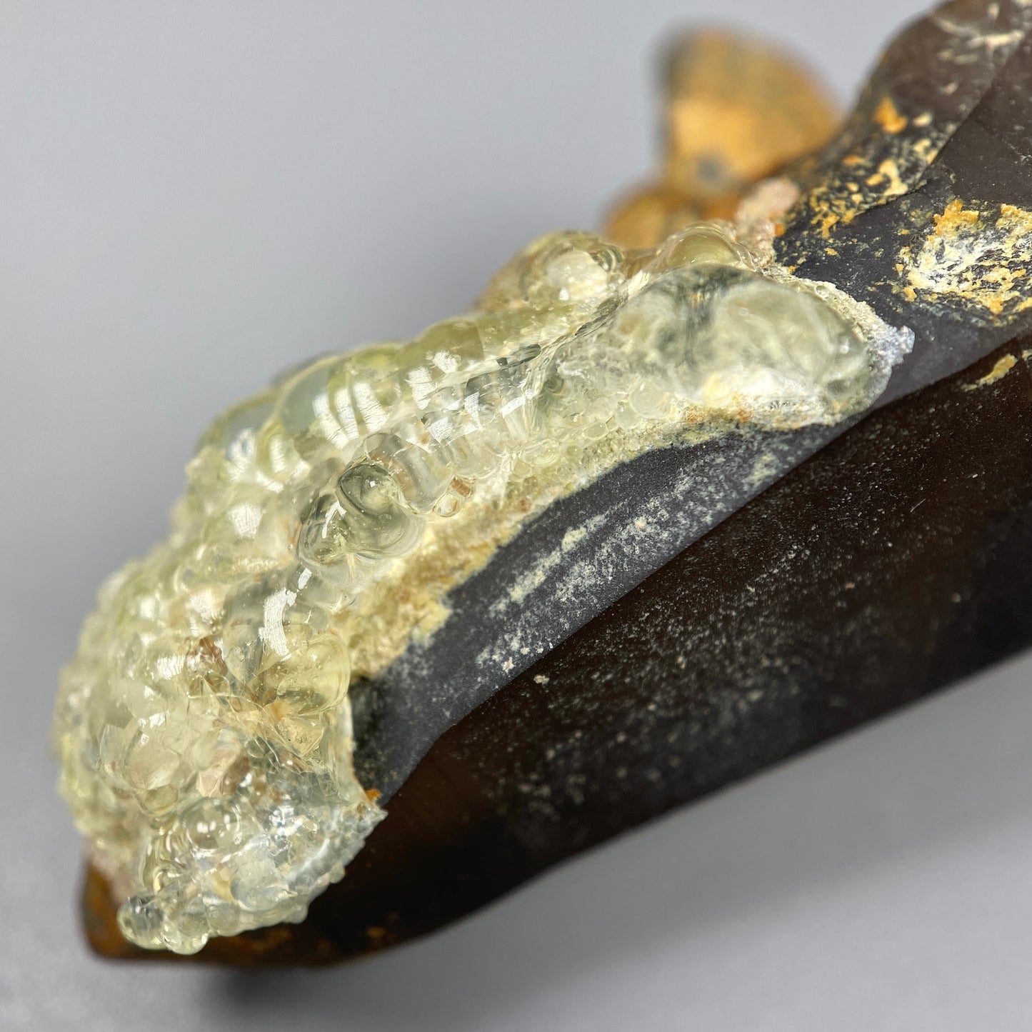19.98 g. Hyalite Opal on Smoky Quartz